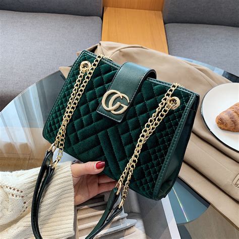 replica gucci bags websites